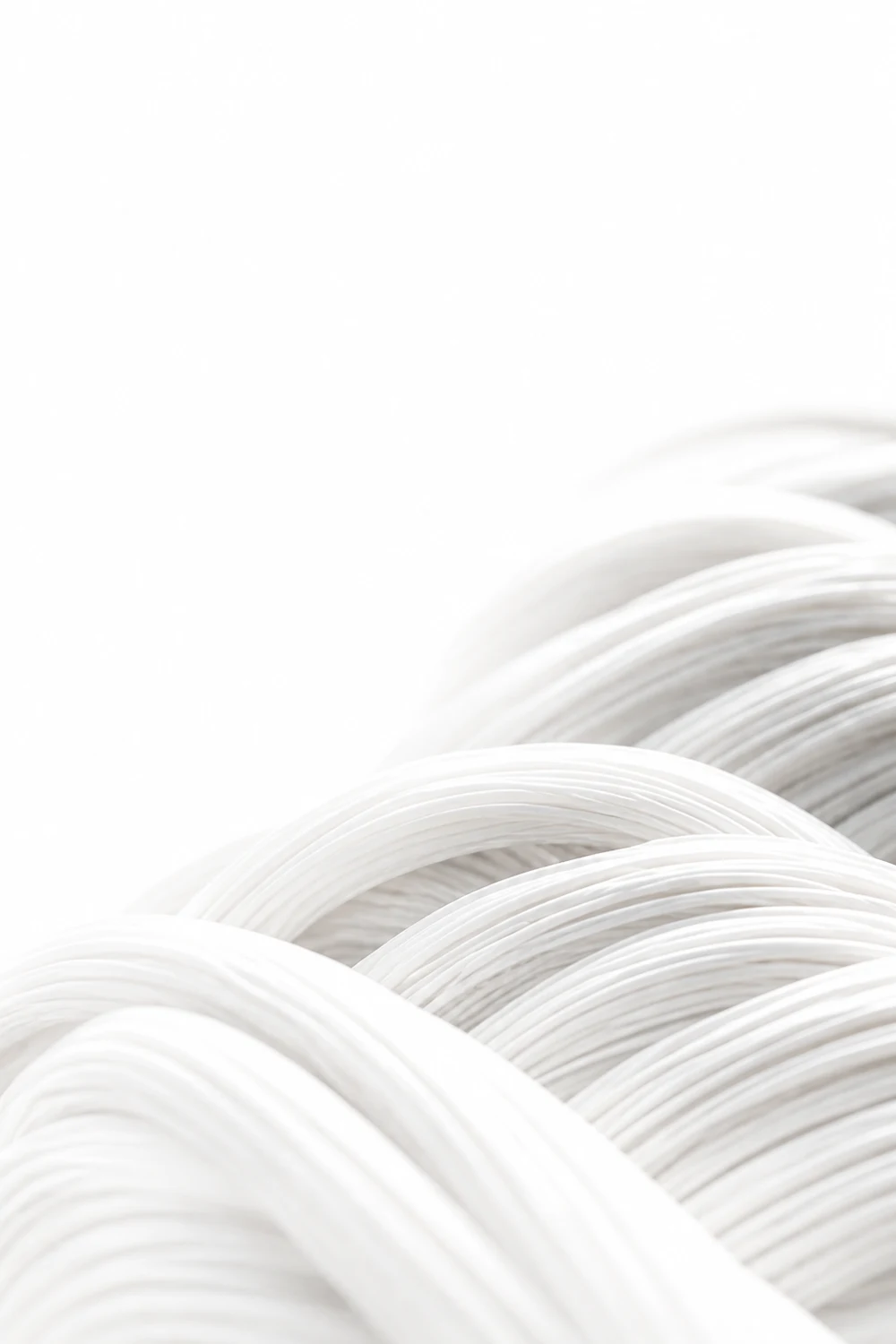 Macro view of layered white material fibres